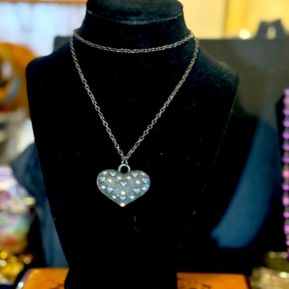 26” gunmetal heart and chain with rhinestones on one side, open hearts on other